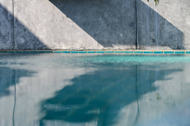 istock blue swimming pool and cement wall, construction industry 1416755604