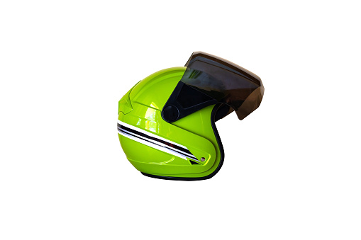 Green motorbike safety  helmet  isolated on white background