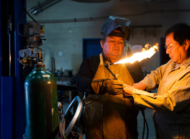 istock Metal workers starting a torch gas welding equipment 1416774026