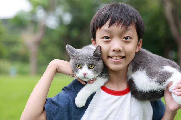 istock Little boy and his cat 1416777930