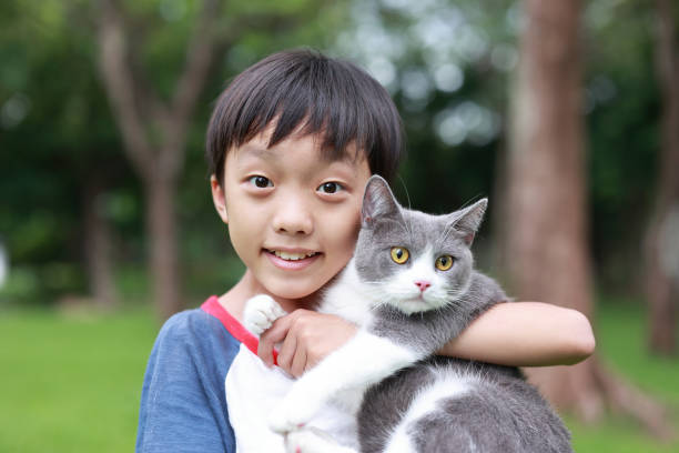 istock Little boy and his cat 1416777946