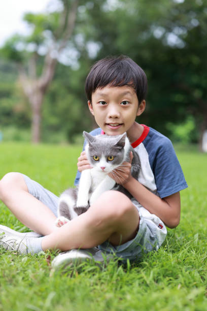 istock Little boy and his cat 1416777969