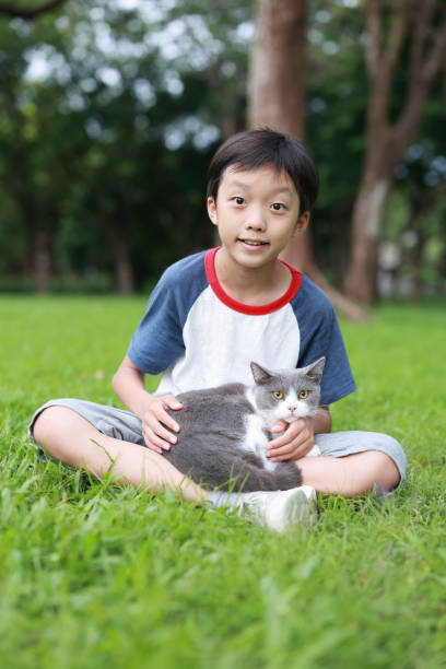 istock Little boy and his cat 1416777982