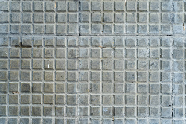 istock Background of square tiles or slabs on a wall. 1416778787