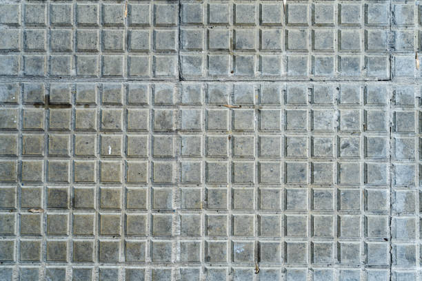 Background of square tiles or slabs on a wall. A Background of square tiles or slabs on a wall. stonewall creek stock pictures, royalty-free photos & images