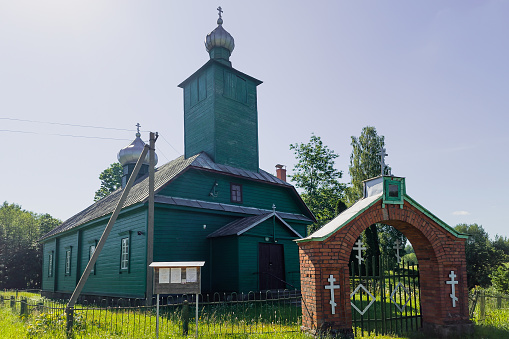 Krivosejeva green Old Believers Church in sunny summer day, Latvia.
