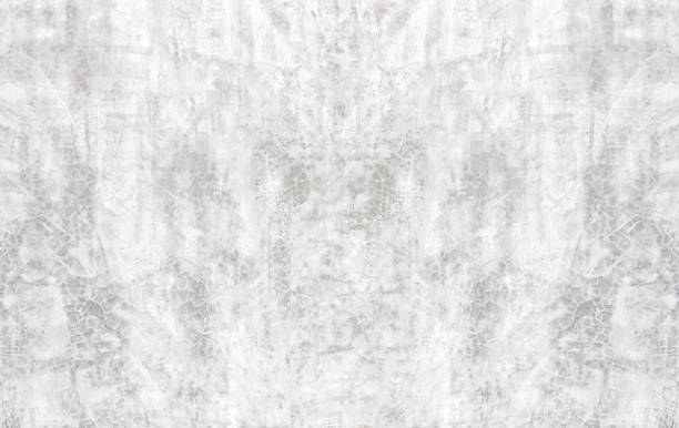 istock White concrete wall,Natural cement wall texture or old stone,retro-background wall texture. Concrete background gray suitable for use in classic design. Concrete loft style design ideas living home. 1416790645