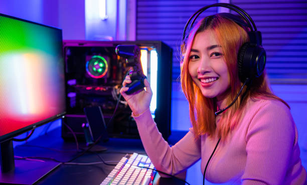 istock Smiling gamer using joystick controller for tournament plays online video game 1416790691