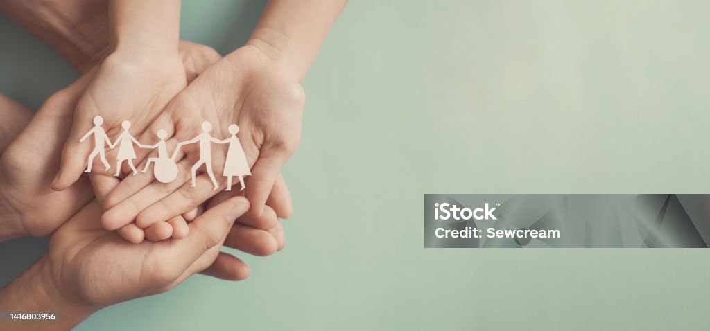 Hands holding diversity family, happy  volunteer, disable nursing home, rehabilitation and health insurance concept Disability Stock Photo