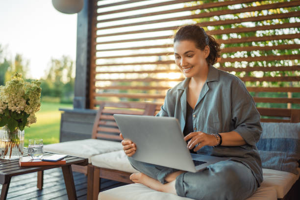 istock woman is working sitting on the patio 1416808818