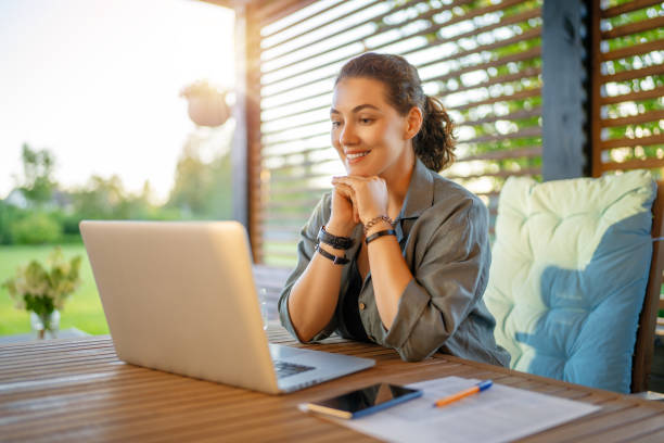 istock woman is working sitting on the patio 1416808823