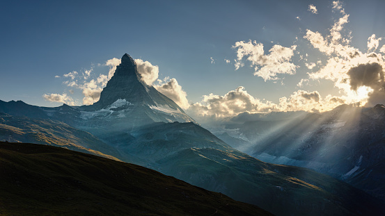 Matterhorn Sunbeams Through Dramatic Clouds at Sunset Matterhorn Peak Switzerland