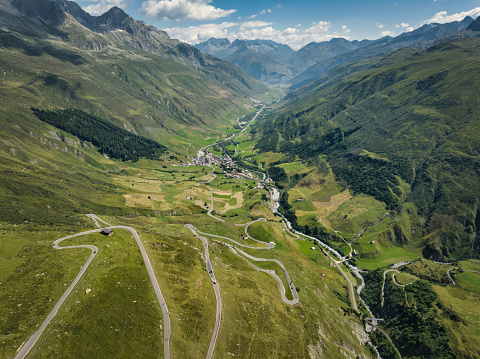 Famous Furka Pass known for the James Bond Strasse. with an elevation of 2,429 metres is a high mountain pass - serpentine road in the Swiss Alps connecting Gletsch, Valais with Realp, Uri. The Furka Pass was used as a location in the James Bond film Goldfinger. A curve is even named \