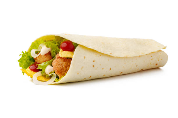 istock Tortilla wrap with fried chicken meat and vegetables isolated on white background 1416818048