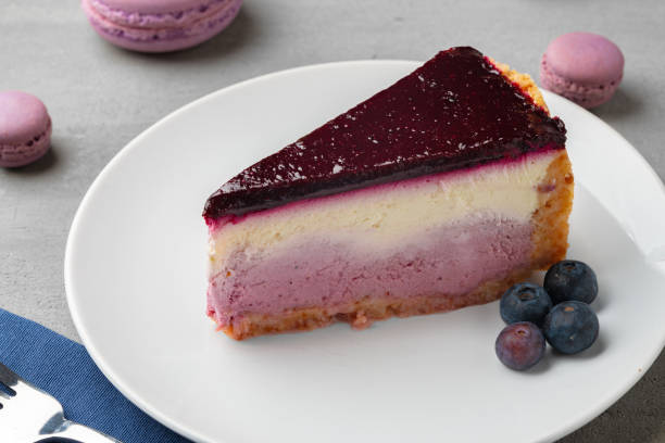 istock Piece of blueberry cheesecake on a white plate 1416821031
