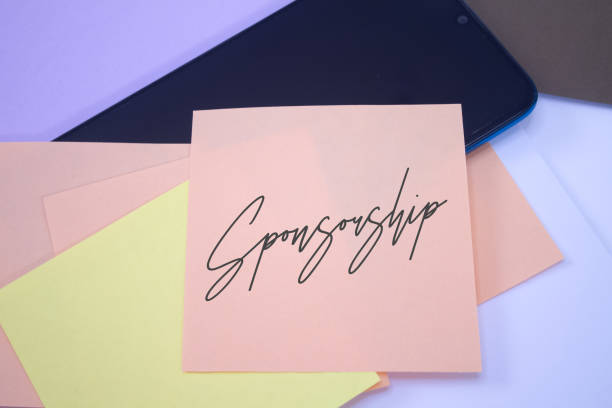 istock Sponsorship. Text on adhesive note paper. Event, celebration reminder message. 1416827601