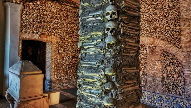 Chapel of the Bones in Evora: its walls are made of human bones Chapel of the Bones in Evora: its walls are made of human bones chapel stock pictures, royalty-free photos & images
