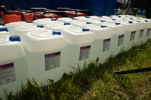 Tatarastan, Russia. 2022, 14 July. Canisters with disinfectant DEOCID. The duration of the protective effect of cereals against diseases.