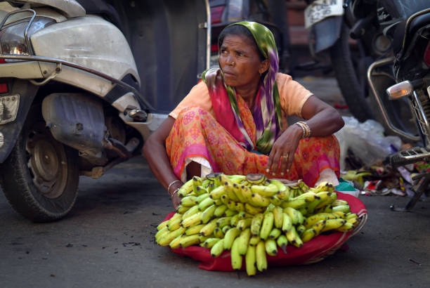 haridwar, uttrakhand, India- 8 ‎august ‎2022 :lady banana seller image hd.