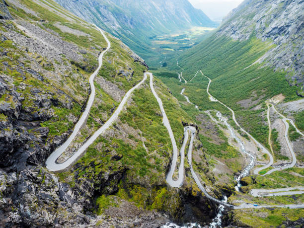 istock Trollstigen or Trolls Path Trollstigveien famous serpentine mountain road from viewpoint in pass on national scenic route Geiranger Trollstigen More og Romsdal county in Norway 1416856579