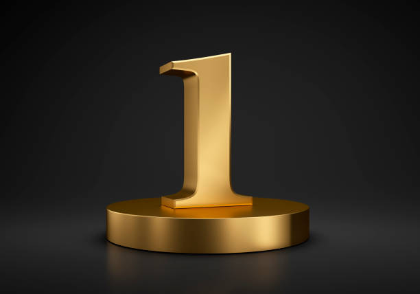 Golden number one on podium Golden number one on podium on black background gold number 1 stock pictures, royalty-free photos & images
