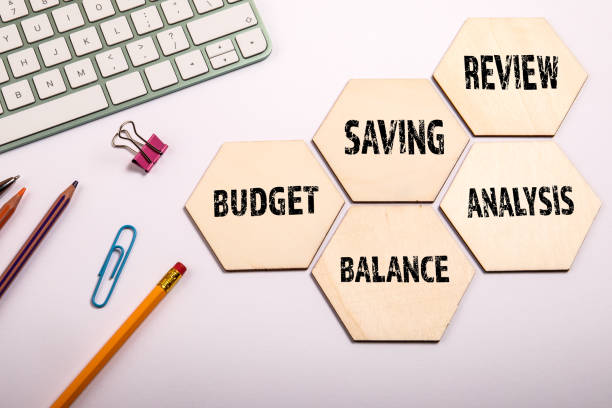 istock Accounting business concept. Office supplies on a white table 1416880311