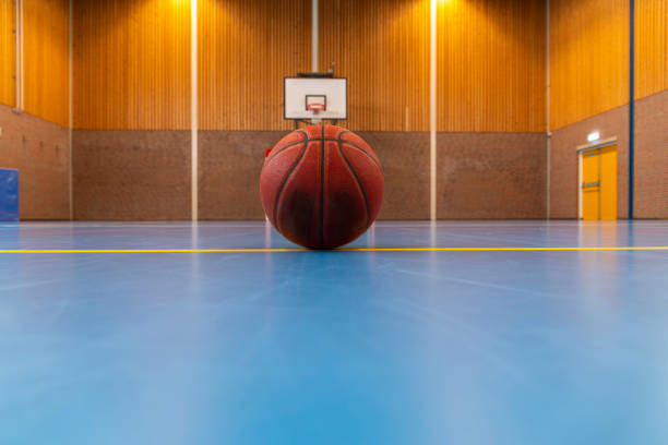 istock Basketball  in an empty Gym. 1416887697