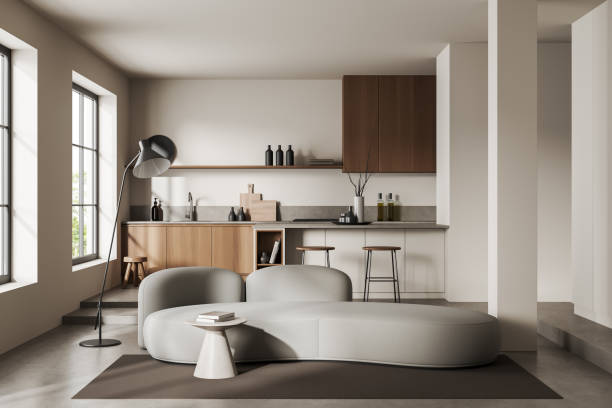 istock Light kitchen interior with couch and bar seats with countertop, panoramic window 1416905291