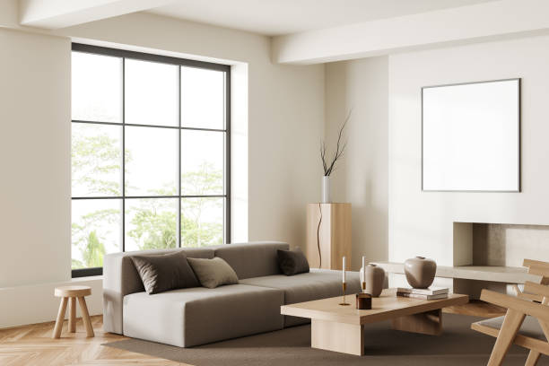 istock Light chill interior with couch and panoramic window, fireplace and mockup frame 1416907132