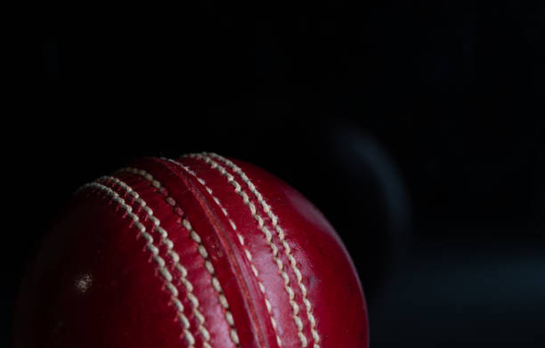 istock Cricket ball on black background 1416908364