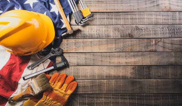 istock Happy Labor day concept. American flag with different construction tools on dark wooden background. 1416912394