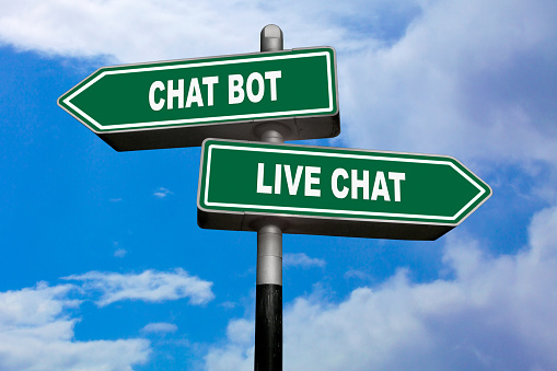 Two direction signs, one pointing left (Chat bot), and the other one, pointing right (Live chat).