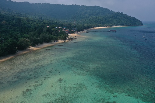 Tioman tropical island drone photo with beautiful blue sea and sky. South China sea. Southeast Asia