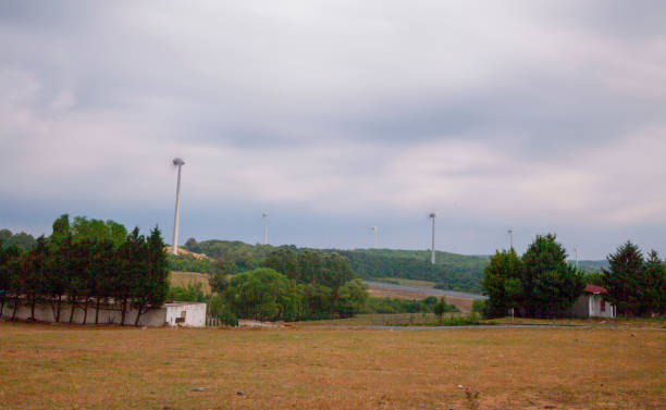 istock Electric windmills on a cloudy day 1416926804