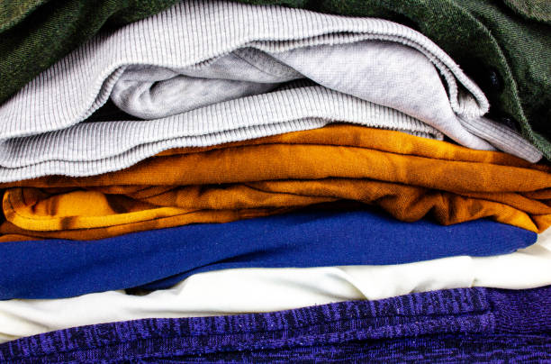 istock Stack of clothes.Casual wear.Folded assorted clothes. 1416928311