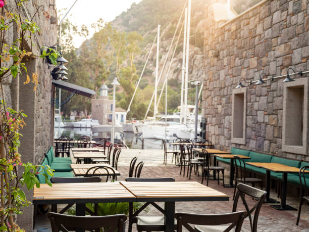 istock empty marble table in front of marina background. Aspat Marina. Bodrum 1416934875