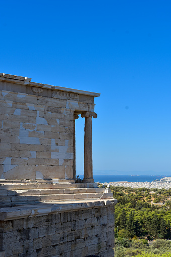 The Acropolis of Athens is an ancient citadel located on a rocky outcrop above the city of Athens, capital city of Greece, and contains the remains of several ancient buildings of great architectural and historical significance, the most famous is the Parthenon.