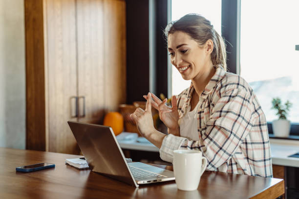 istock Young woman talking on a video call 1416941437