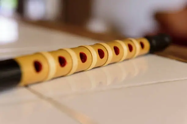 Closeup of a bamboo flute on a table