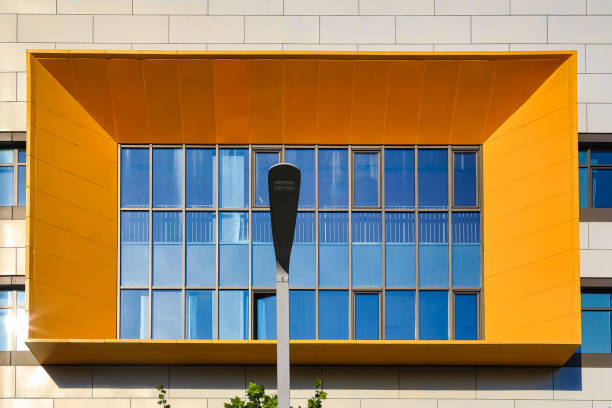 istock blue sky and white clouds color building 1416945572