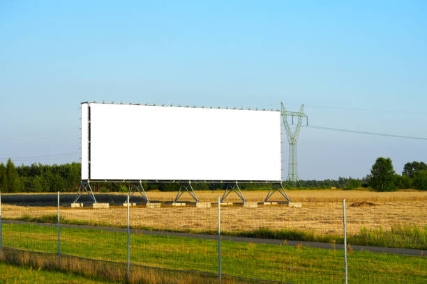 istock blank advertising billboard mockup. template for design. advertising billboard at sunset 1416947060