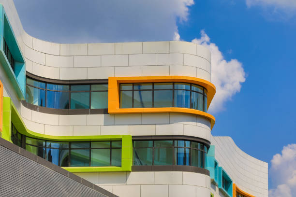 istock blue sky and white clouds color building 1416949328