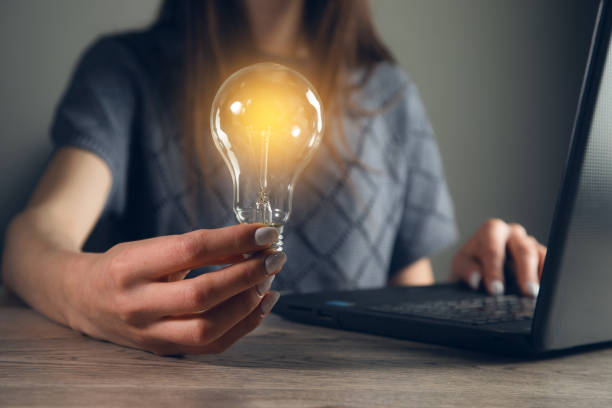 istock woman Hand holding Light bulb Global Internet connection 1416949797