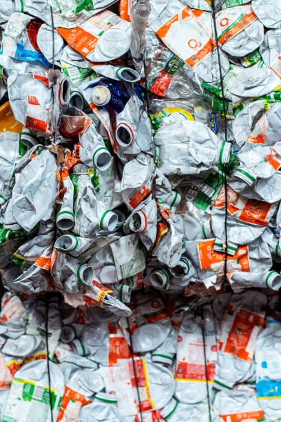 istock Crushed and compressed plastic bottles tied up with wire 1416950211