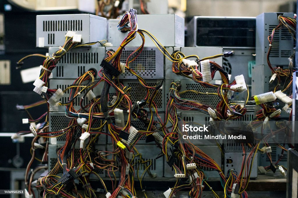 Old computer components in electronic recycling plant Front shot of old computer components in waste electronic recycling plant Argentina Stock Photo