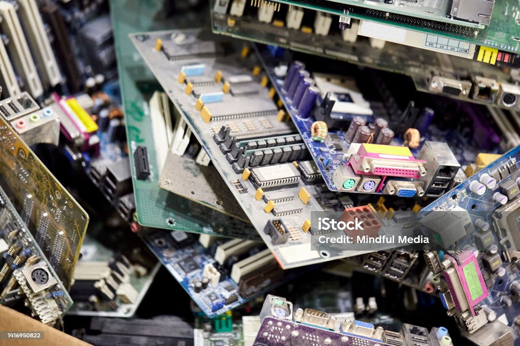 A heap of electronic and computer hardware waste for recycling Close-up of a heap of electronic and computer hardware waste for recycling Recycling Stock Photo