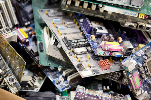 A heap of electronic and computer hardware waste for recycling stock photo