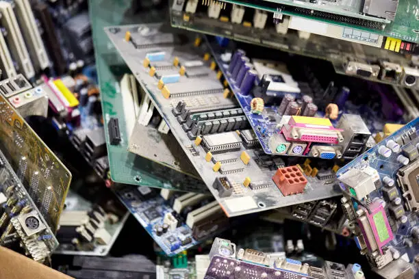 Close-up of a heap of electronic and computer hardware waste for recycling