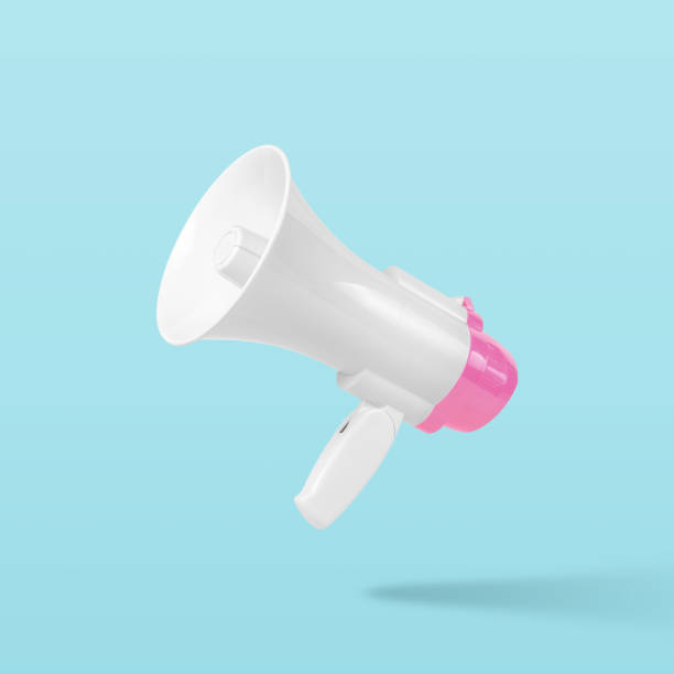 istock White-pink megaphone on pastel blue background. Minimal advertising concept. 1416952393