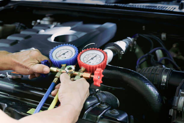 istock Car air conditioner check service, leak detection, fill refrigerant. 1416953553